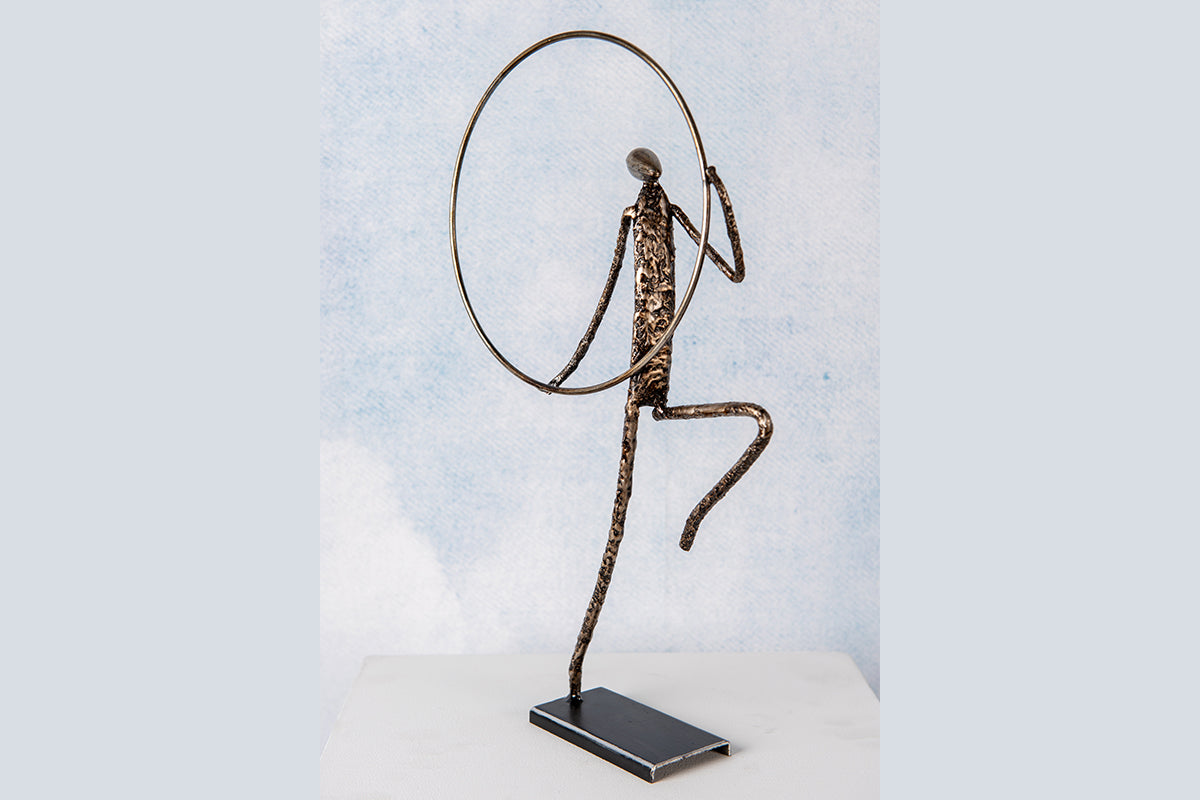 Statuette métal homme cerceau