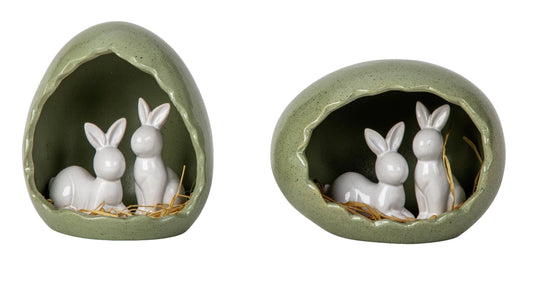 Lapins dans nid d'oeuf