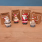 Figurine Noël dans sac
