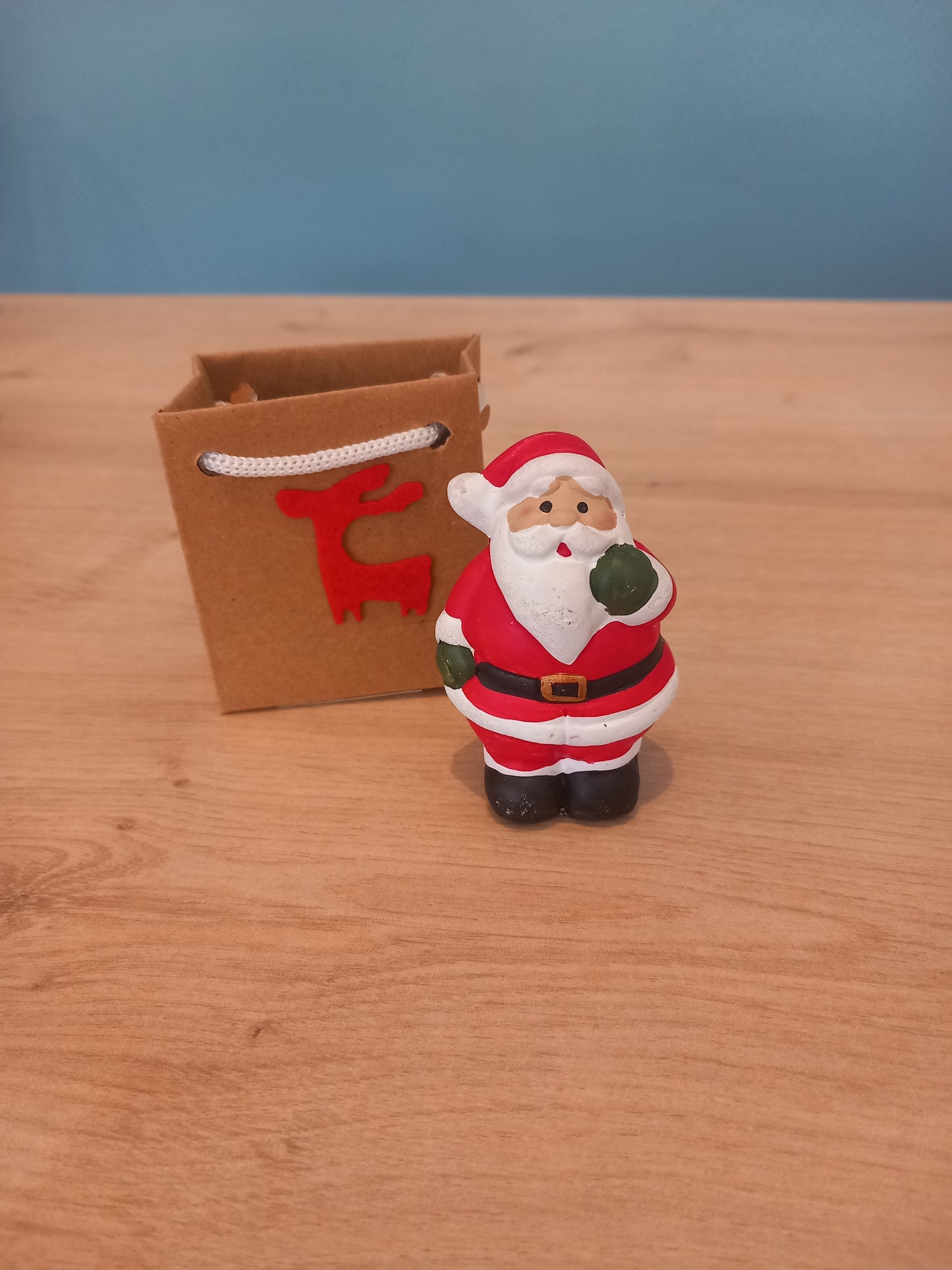 Figurine Noël dans sac