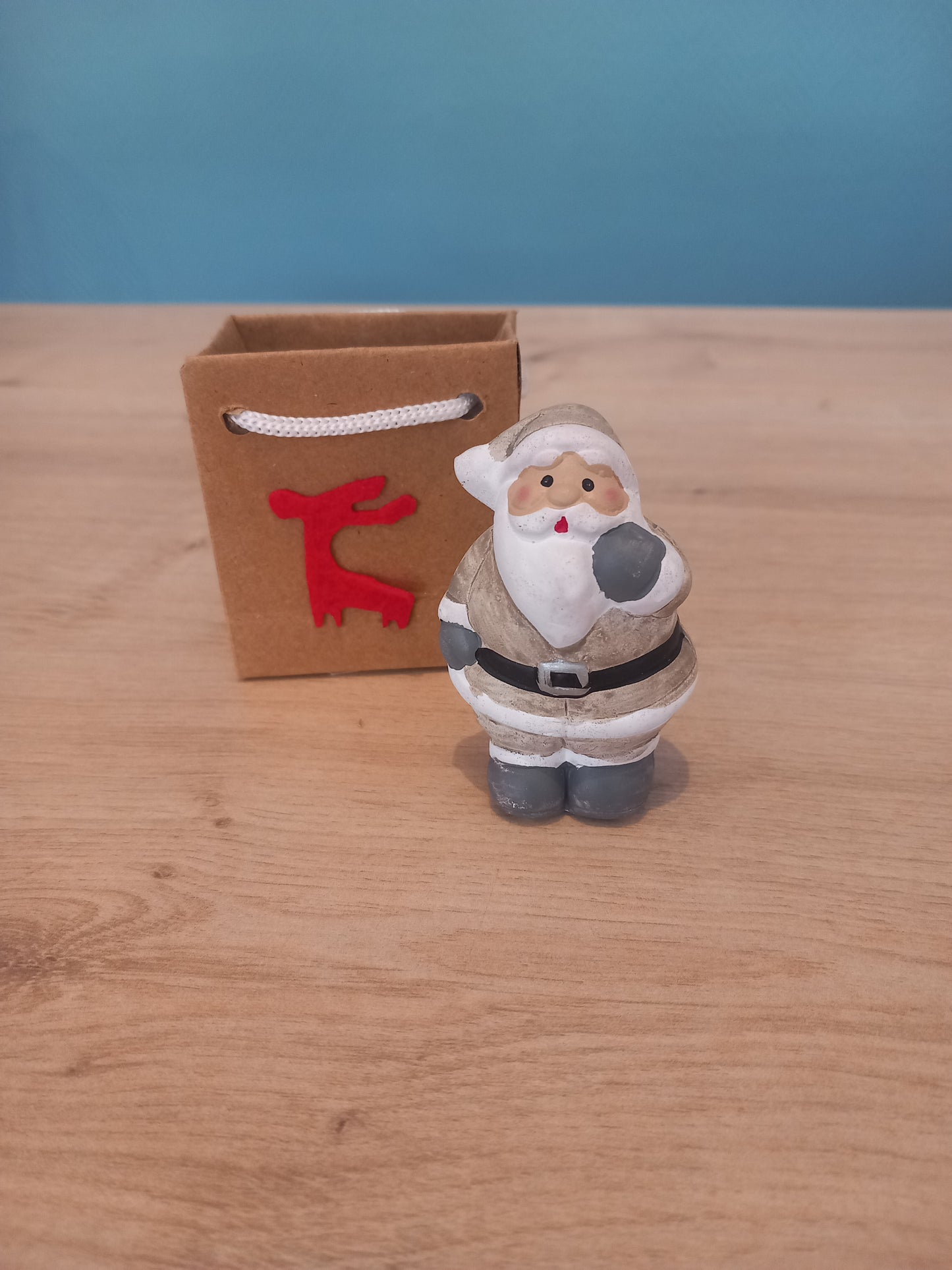Figurine Noël dans sac